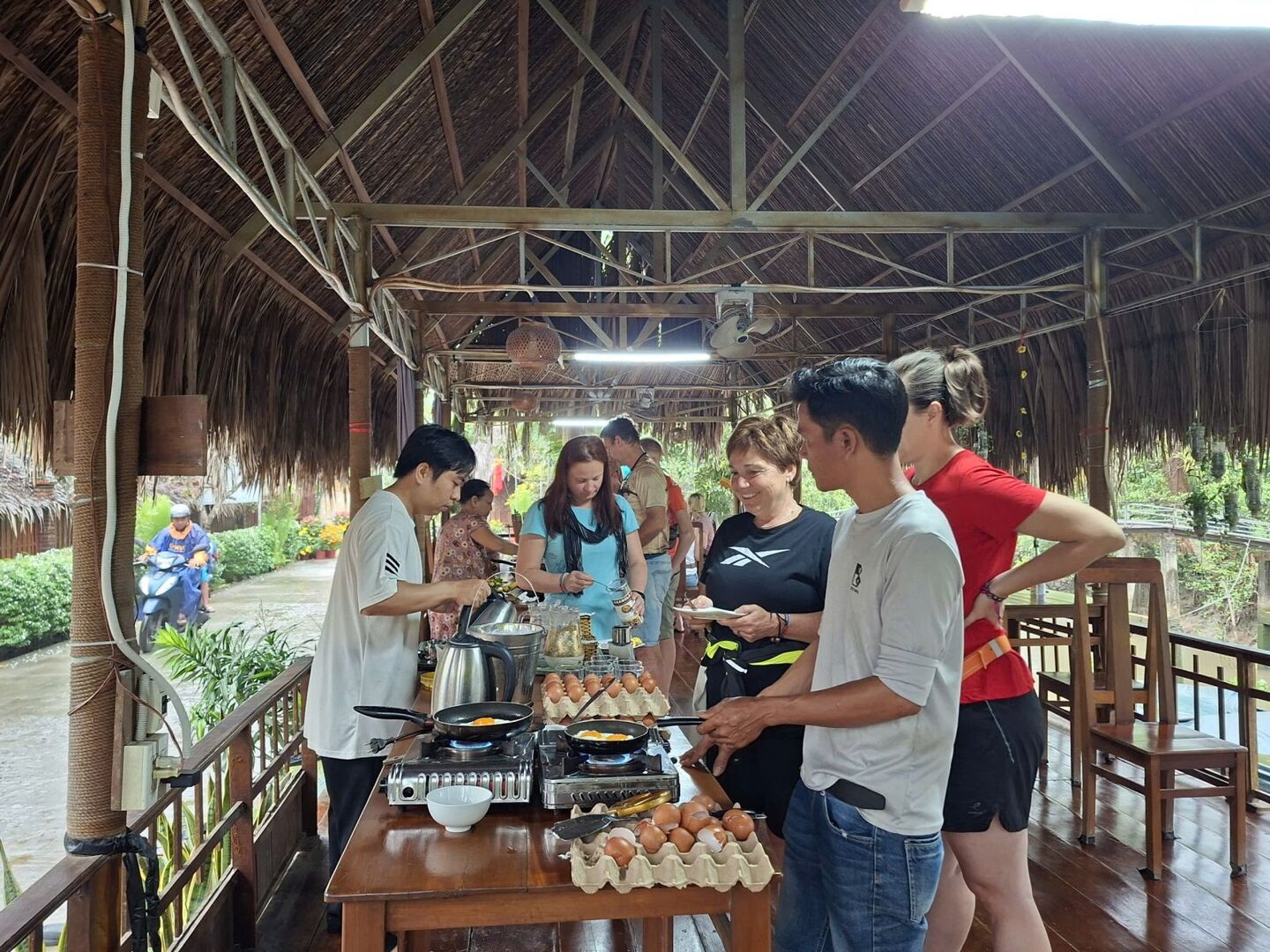 Guests at a cooking class in the pavilion.