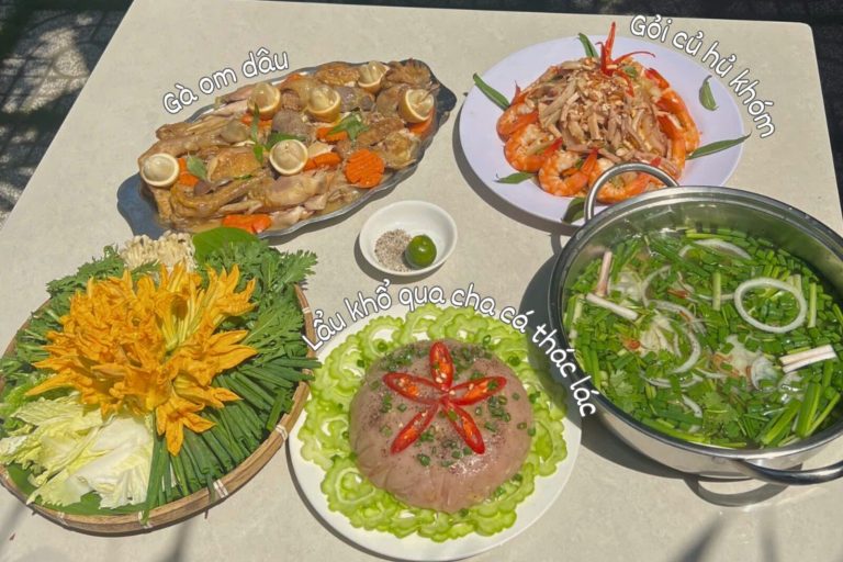 A labelled spread: chicken braised with gooseberries, pineapple-core salad with prawns and a fishcake hotpot.