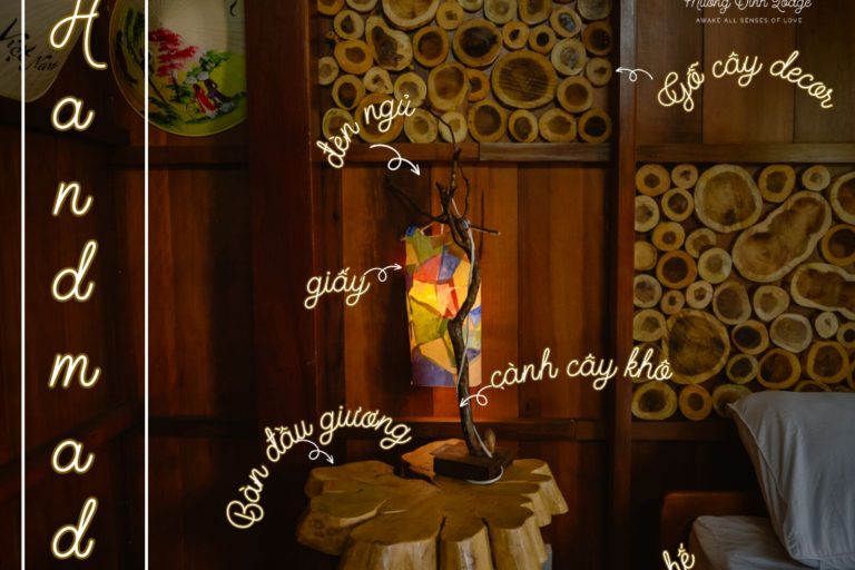 A wooden room corner with a paper lamp and bedside table, labelled Handmade with notes on its branch and wood decor.