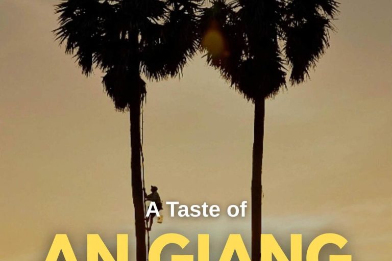 A climber on a tall palm silhouetted against a golden sky, titled A Taste of An Giang.