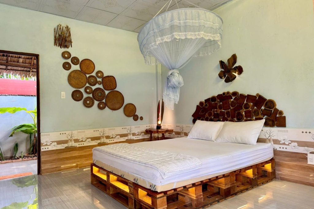 Superior room with pallet bed and wall decor.